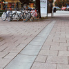 Ränndalsplatta vid en cykelparkering